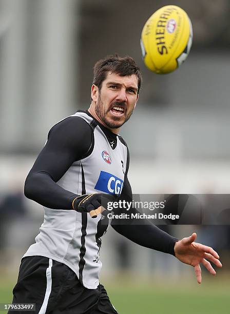 Quinten Lynch looks at the ball during a Collingwood Magpies AFL training session at Olympic Park on September 6, 2013 in Melbourne, Australia.