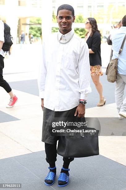 Ell Hollman is seen wearing Givenchy shoes, a Helmut Lang skirt and an Hermes purse on the Streets of Manhattan on September 5, 2013 in New York City.