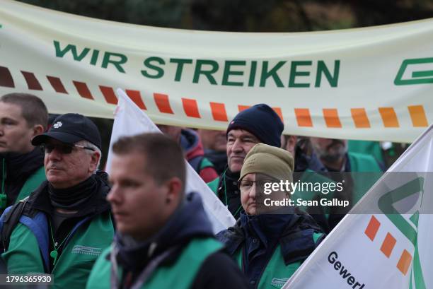 Striking members of the GDL train engineers labour union gather in front of an administrative building of German state rail carrier Deutsche Bahn...