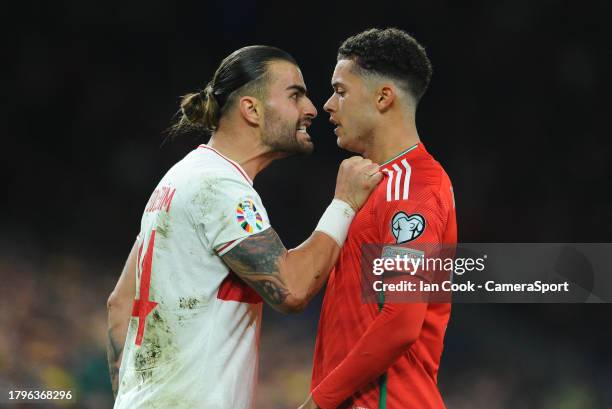 Wales' Brennan Johnson and Turkey's Abdulkerim Bardakci square up during the UEFA EURO 2024 European qualifier match between Wales and Turkey at...