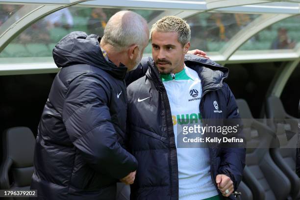 Jamie Maclaren of the Socceroos speaks with Socceroos head coach Graham Arnold pre-match during the 2026 FIFA World Cup Qualifier match between...