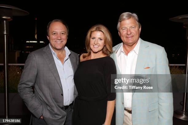 Jim Keyes, Janelle Moore and Charles Ward attend the Auto Gallery Event at the residences at W Hollywood on September 5, 2013 in Hollywood,...