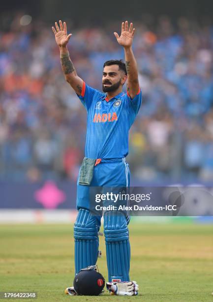 Virat Kohli of India celebrates after scoring a century, overtaking Sachin Tendulkar for the all time most ODI centuries during the ICC Men's Cricket...