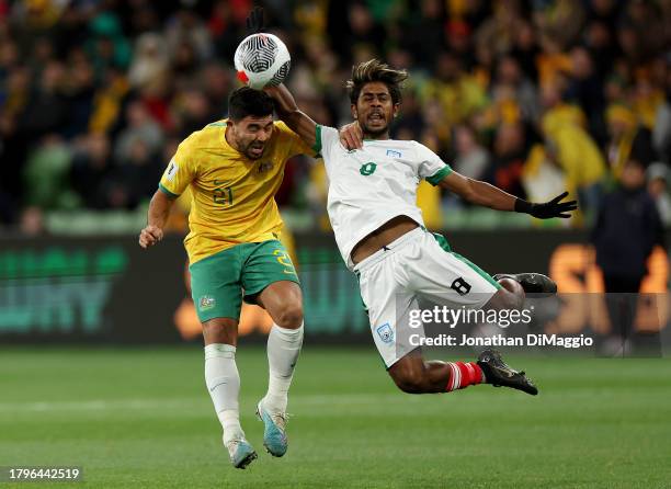 Massimo Luongo of the Socceroos and Mohammad Rabiul of Bangladesh contest for the ball during the 2026 FIFA World Cup Qualifier match between...