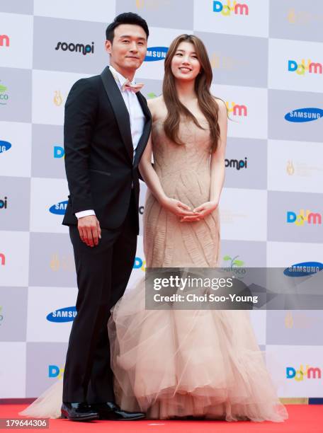 Lee Sung-Jae and Su-Zy arrive at the red carpet of the Seoul International Drama Awards 2013 at the National Theater of Korea Main Hall 'Hae' on...