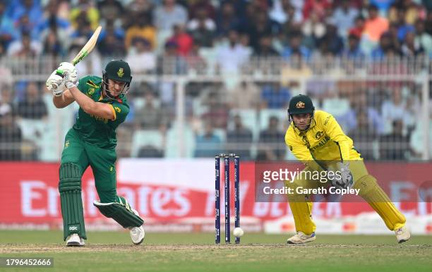 David Miller of South Africa bats as Josh Inglis of Australia keep during the ICC Men's Cricket World Cup India 2023 Semi Final match between South...