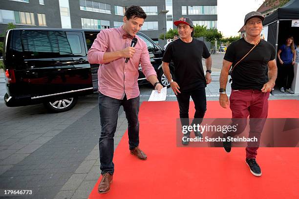 Tim Warwood, Ross Clarke-Jones and Tom Carroll attend the 'Heroes By Nature' Surf Night at Cineplex on September 5, 2013 in Muenster, Germany.