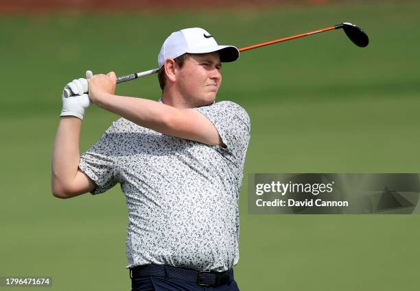 Robert MacIntyre of Scotland plays his second shot on the second hole during the first round on Day One of the DP World Tour Championship on the...