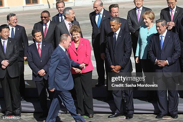 Russian President Vladimir Putin, U.S. Brazilian President Dilma Rousseff, President Barack Obama, British Prime Minister David Cameron, German...