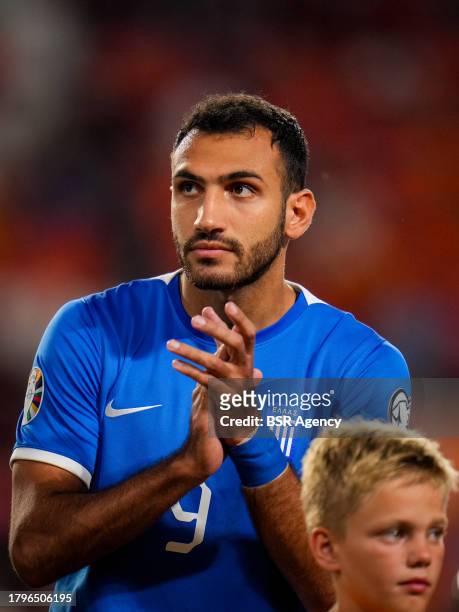 Vangelis Pavlidis of Greece of Greece sings along with the national anthem prior to the UEFA EURO 2024 European Qualifiers match between Netherlands...