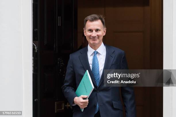Britain's Chancellor of the Exchequer Jeremy Hunt leaves 11 Downing Street ahead of the announcement of the Autumn Statement in the House of Commons...