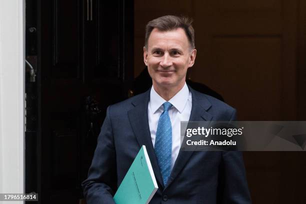 Britain's Chancellor of the Exchequer Jeremy Hunt leaves 11 Downing Street ahead of the announcement of the Autumn Statement in the House of Commons...