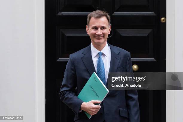 Britain's Chancellor of the Exchequer Jeremy Hunt leaves 11 Downing Street ahead of the announcement of the Autumn Statement in the House of Commons...