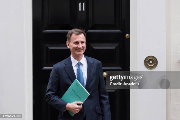 Britain's Chancellor of the Exchequer Jeremy Hunt leaves 11 Downing Street ahead of the announcement of the Autumn Statement in the House of Commons...