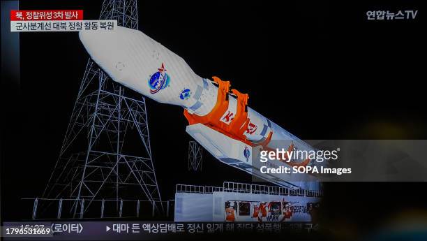 News screen at Seoul's Yongsan Railway Station shows a report that North Korea's reconnaissance satellite, its third attempted launch this year, has...
