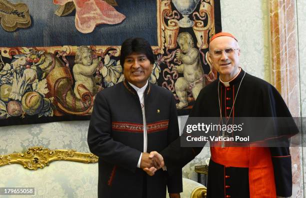 Vatican Secretary of State Cardinal Tarcisio Bertone meets Bolivia President Evo Morales on September 6, 2013 in Vatican City, Vatican. The...