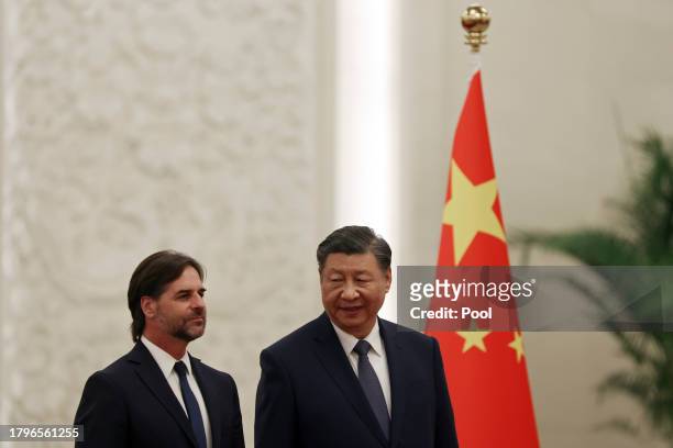 Chinese President Xi Jinping and Uruguay President Luis Lacalle Pou attend a welcome ceremony at The Great Hall of the People on November 22, 2023 in...