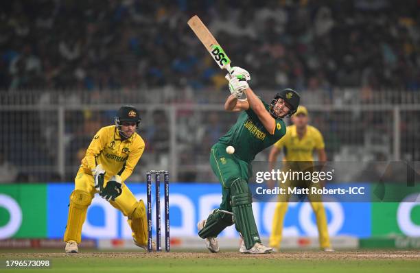 David Miller of South Africa bats as Josh Inglis of Australia keeps during the ICC Men's Cricket World Cup India 2023 Semi Final match between South...