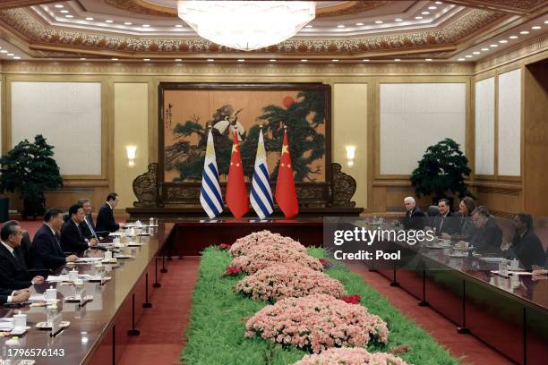 Chinese President Xi Jinping and Uruguay President Luis Lacalle Pou attend a meeting at The Great Hall of the People on November 22, 2023 in Beijing,...