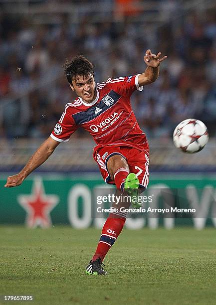 Clement Grenier of Olympique Lyonnais shoots the ball during the UEFA Champions League Play-offs second leg match between Real Sociedad and Olympique...