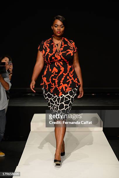 Model poses at the Fashion Law Institute Spring 2014 fashion presentation during Mercedes-Benz Fashion Week at The Box at Lincoln Center on September...