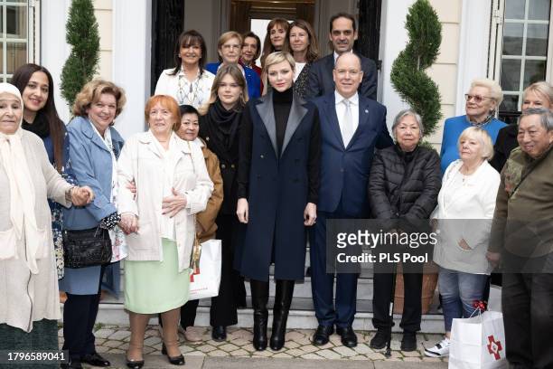 Camille Gottlieb, Princess Charlene of Monaco and Prince Albert II of Monaco attend the Red Cross Gifts Distribution on November 16, 2023 in Monaco,...