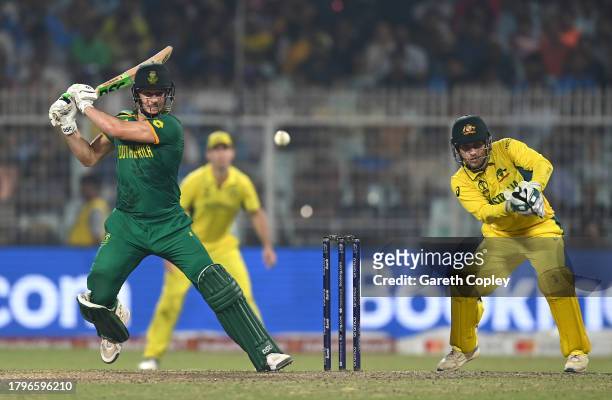 David Miller of South Africa bats as Josh Inglis of Australia keeps during the ICC Men's Cricket World Cup India 2023 Semi Final match between South...