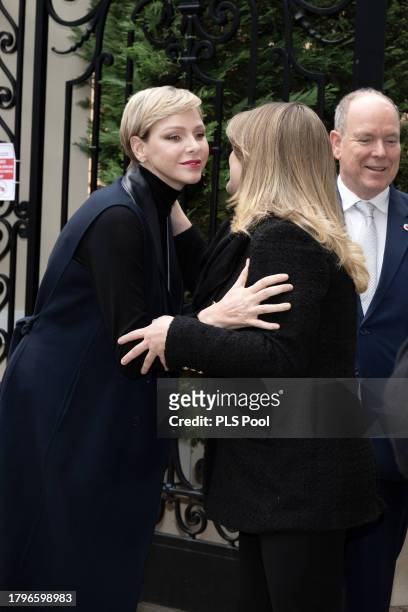 Princess Charlene of Monaco , Camille Gottlieb and Prince Albert II of Monaco attend the Red Cross Gifts Distribution on November 16, 2023 in Monaco,...