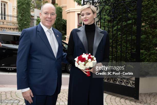Prince Albert II of Monaco and Princess Charlene of Monaco attend the Red Cross Gifts Distribution at Monaco Palace on November 16, 2023 in Monaco,...
