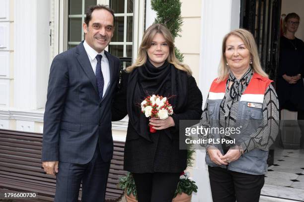 Frederic Platini, Camille Gottlieb and a guest pose during the Red Cross Gifts Distribution on November 16, 2023 in Monaco, Monaco.