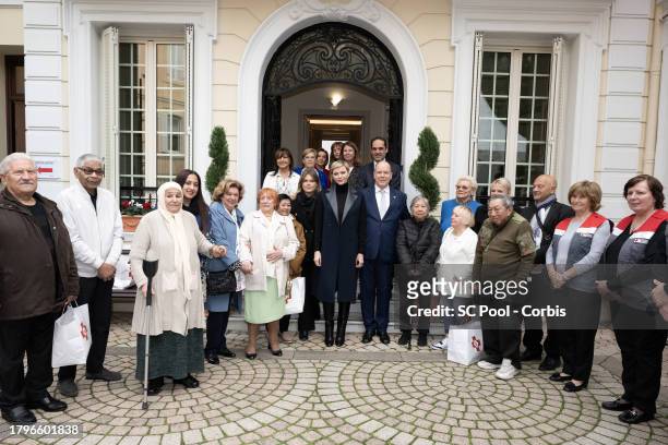 Camille Gottlieb, Princess Charlene of Monaco and Prince Albert II of Monaco attend the Red Cross Gifts Distribution at Monaco Palace on November 16,...