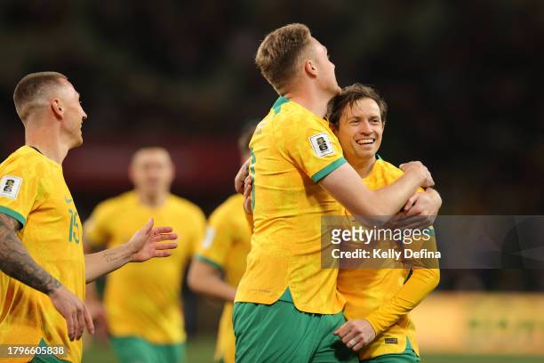 Harry Souttar of the Socceroos celebrates scoring a goal with Craig Goodwin of the Socceroos during the 2026 FIFA World Cup Qualifier match between...