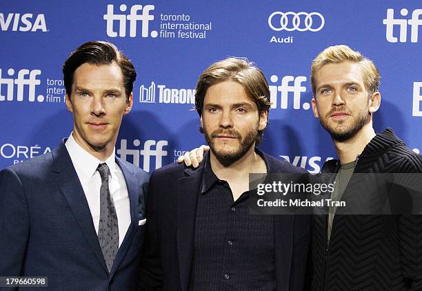 Benedict Cumberbatch, Daniel Bruhl and Dan Stevens attend "The Fifth Estate" press conference during the 2013 Toronto International Film Festival...