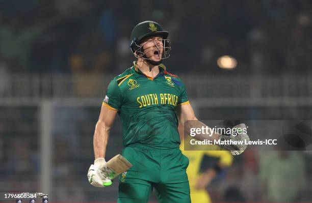 David Miller of South Africa celebrates after scoring a century during the ICC Men's Cricket World Cup India 2023 Semi Final match between South...