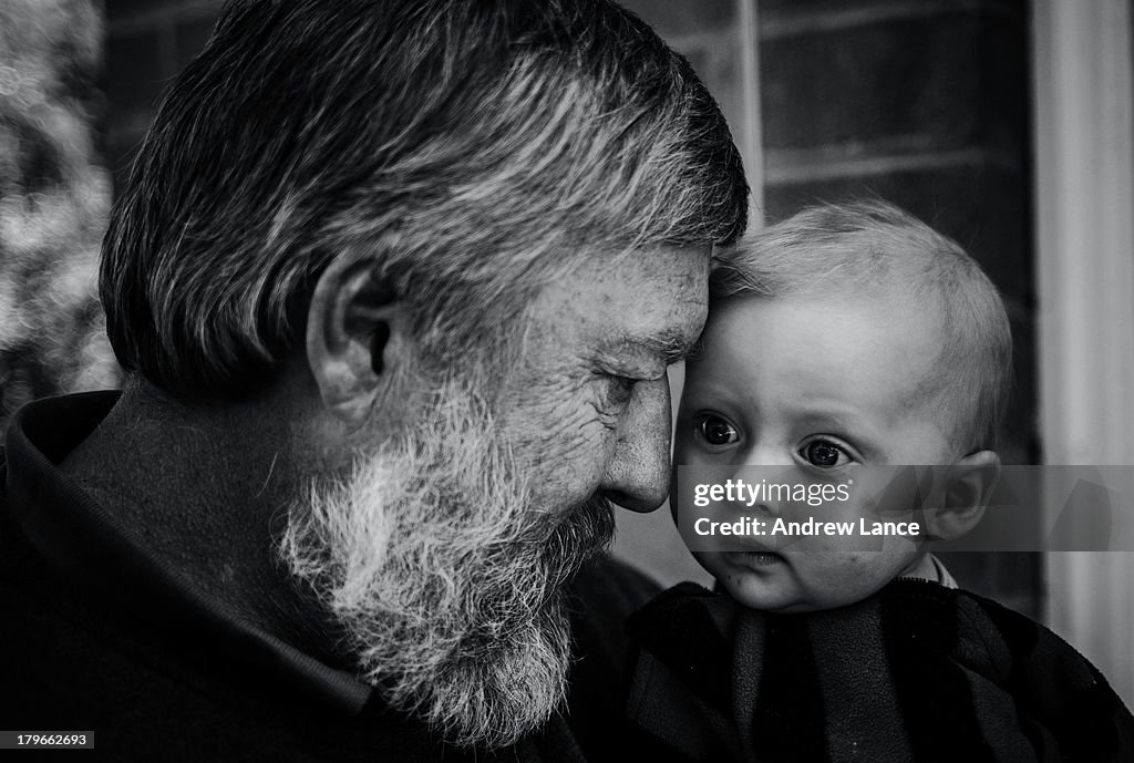 Grandfather embracing his grandson