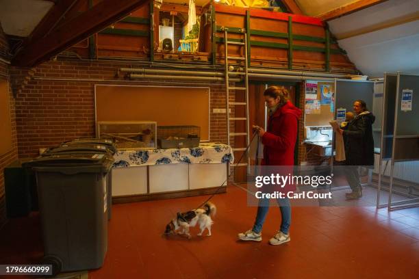 Woman votes in a polling station inside a city farm during the Dutch general election on November 22, 2023 in Scheveningen, Netherlands. A snap...