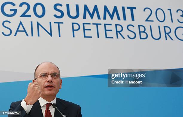 In this handout image provided by Host Photo Agency, Prime Minister of Italy Enrico Letta speaks during a press conference at the end of the G20...