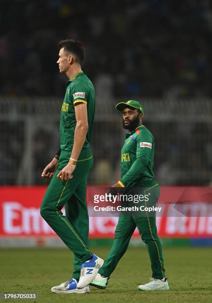 Temba Bavuma of South Africa looks on towards teammate Marco Jansen during the ICC Men's Cricket World Cup India 2023 Semi Final match between South...
