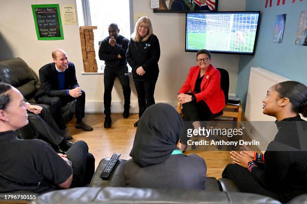 Prince William, Prince of Wales, Hideaway Youth Project Operational Manager, Irvine Williams, Hideaway Youth Project Director, Julie Wharton and...