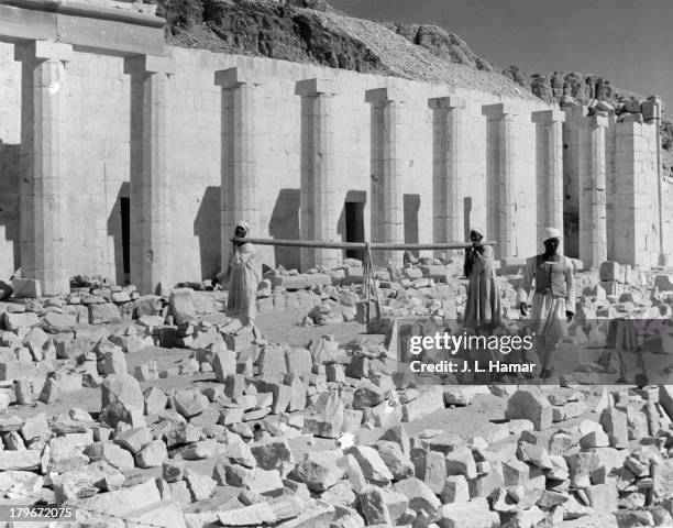 Workers restore the The Mortuary Temple of Queen Hatshepsut in Deir el Bahari, Egypt.
