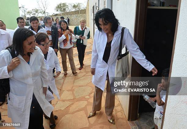 Foreign doctors, mostly Cubans, involved in the Brazilian government's "More Doctors" program, visit the Indigenous Health Shelter that supports...