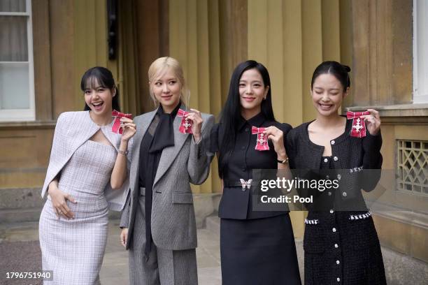 Lisa , Rose , Jisoo Kim and Jennie Kim, from the K-Pop band Blackpink pose with their Honorary MBEs , awarded to them in recognition of the band's...