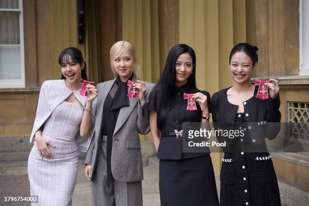 Lisa , Rose , Jisoo Kim and Jennie Kim, from the K-Pop band Blackpink pose with their Honorary MBEs , awarded to them in recognition of the band's...