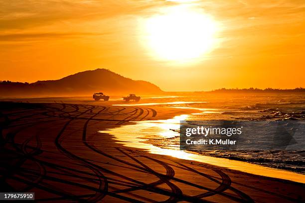 beach highway sunset - moreton island stock pictures, royalty-free photos & images