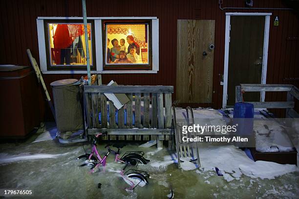 family home in ilulissat, greenland - woman looking through ice stock pictures, royalty-free photos & images