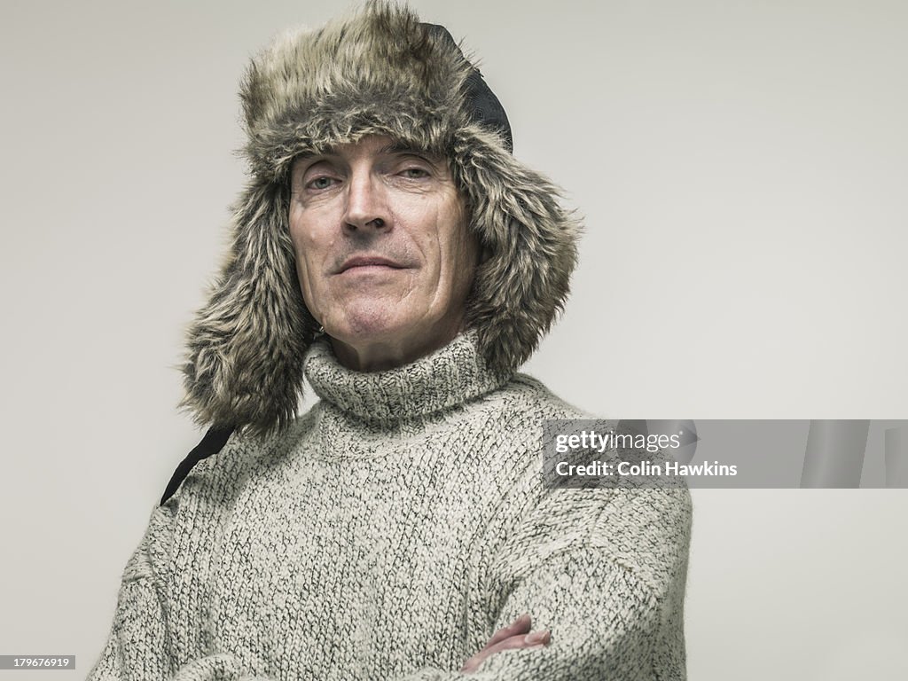 Elderly man in warm winter clothing