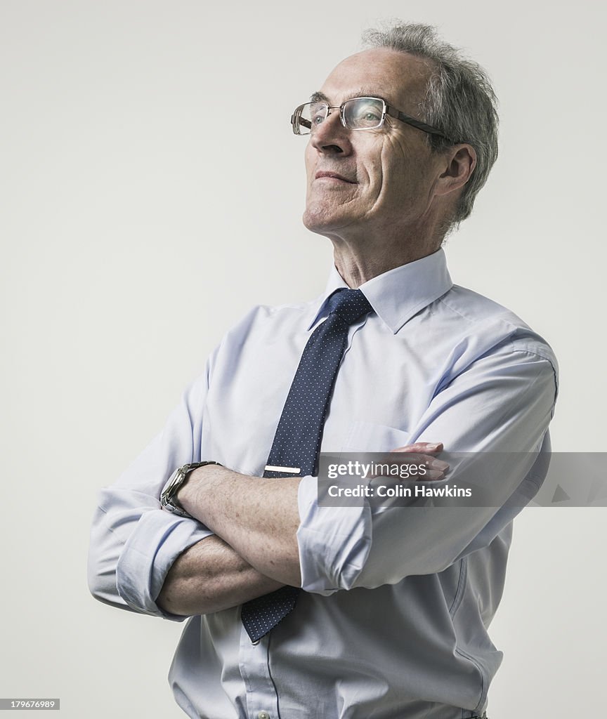 Confident elderly business man