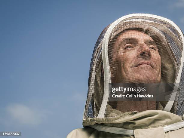 senior male beekeeper - apiculture stock pictures, royalty-free photos & images