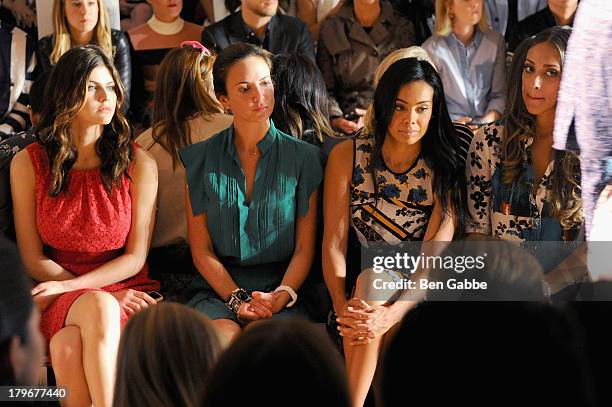 Alexandra Daddario Brandi Garnett and Julie Landrum attend the Peter Som Spring 2014 fashion show during Mercedes-Benz Fashion Week at Milk Studios...