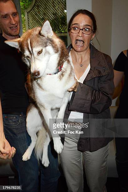 Millions dÓAmis Magazine Editor Katia Renard and dog Tallula attend the Duo Delice Dog Food Launch Party at 6 Mandel on September 6, 2013 in Paris,...